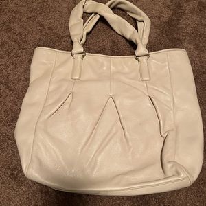 white leather , teal inside